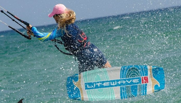 woman with litewave kiteboard